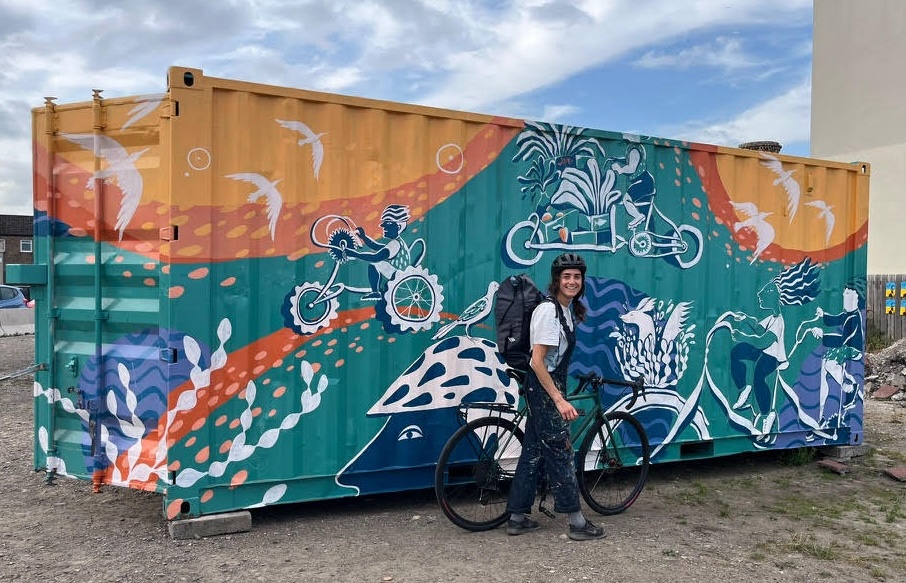 Natasha Russel and her mural on the Porty Active Travel Hub