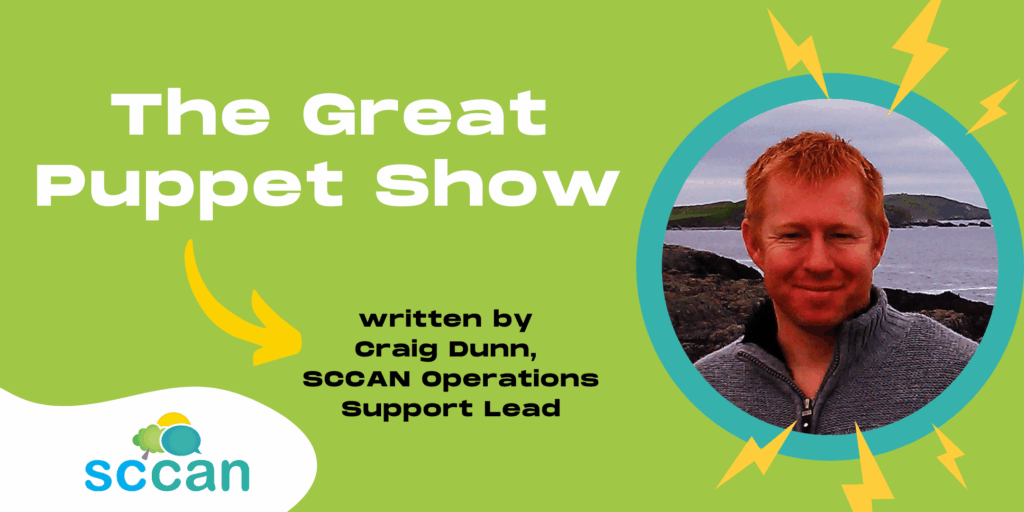 Craig Dunn, SCCAN Operations Support Lead, pictured beside the title “The Great Puppet Show”